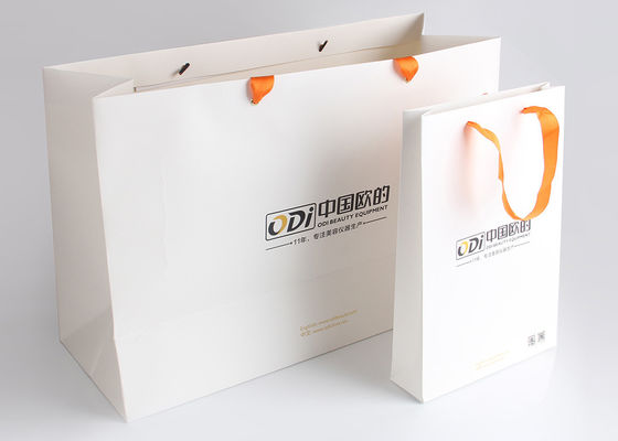 بسته بندی هدیه بسته بندی تزئینی بسته بندی کیسه های لوگو چاپ شده برای تجهیزات زیبایی